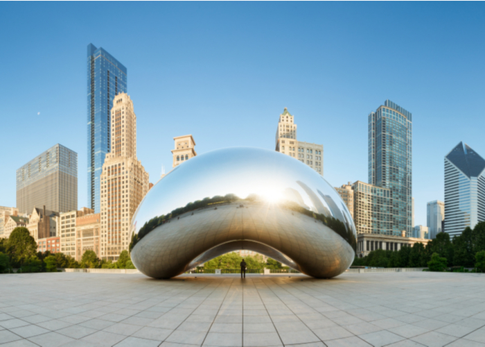Anish Kapoor’s mirrored Cloud Gate sculpture with the Chicago skyline behind