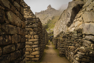 A stone corridor in the ruins of Machu Picchu, Peru